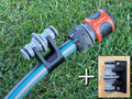 Hose and assembly holder for extension coupler